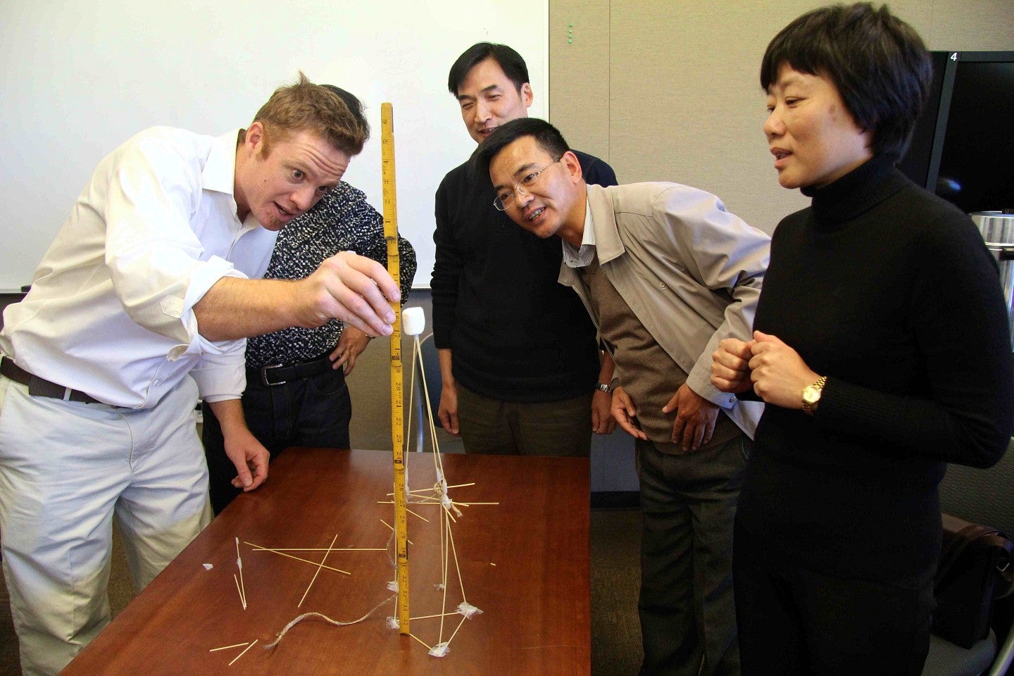 CAPS visiting scholars participating in marshmallow challenge