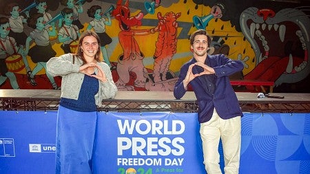 University of Oregon Journalism students throw their O’s in front of the World Press Freedom Conference 2024 stage in Santiago, Chile